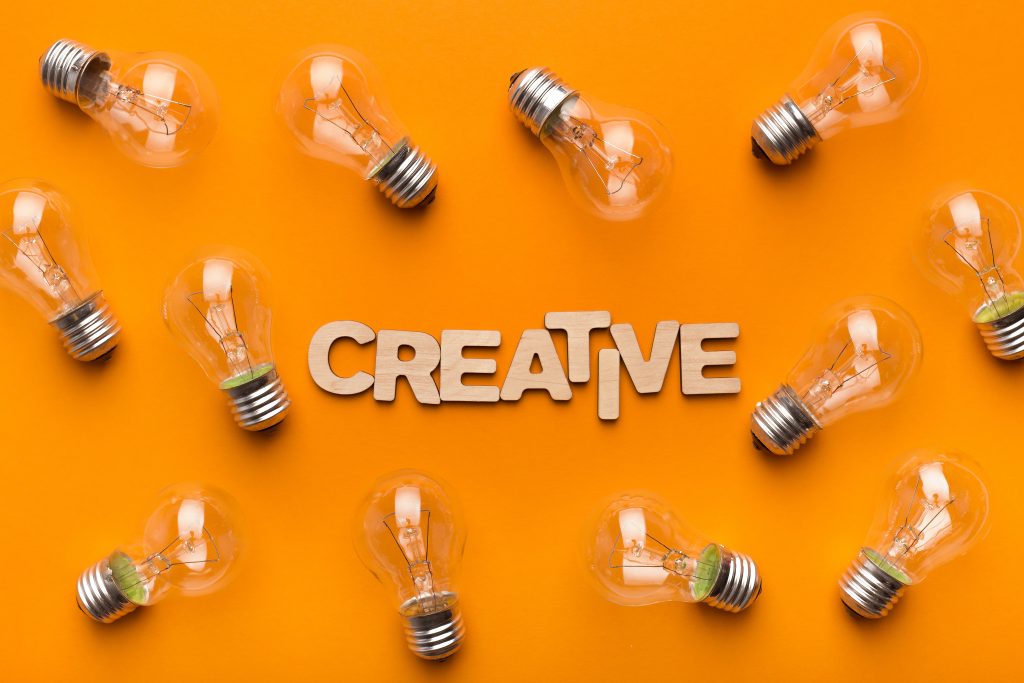 Abstract creative background with light bulbs